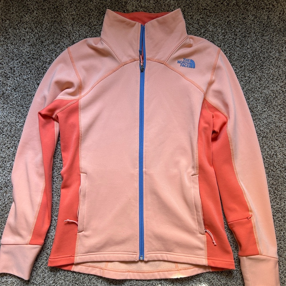 North Face zip up! Size medium in light orange!